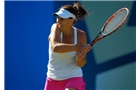 BIRMINGHAM, ENGLAND - JUNE 12:  Casey Dellacquia of Australia hits a return during Day Four of the Aegon Classic at Edgbaston Priory Club on June 12, 2014 in Birmingham, England.  (Photo by Paul Thomas/Getty Images)